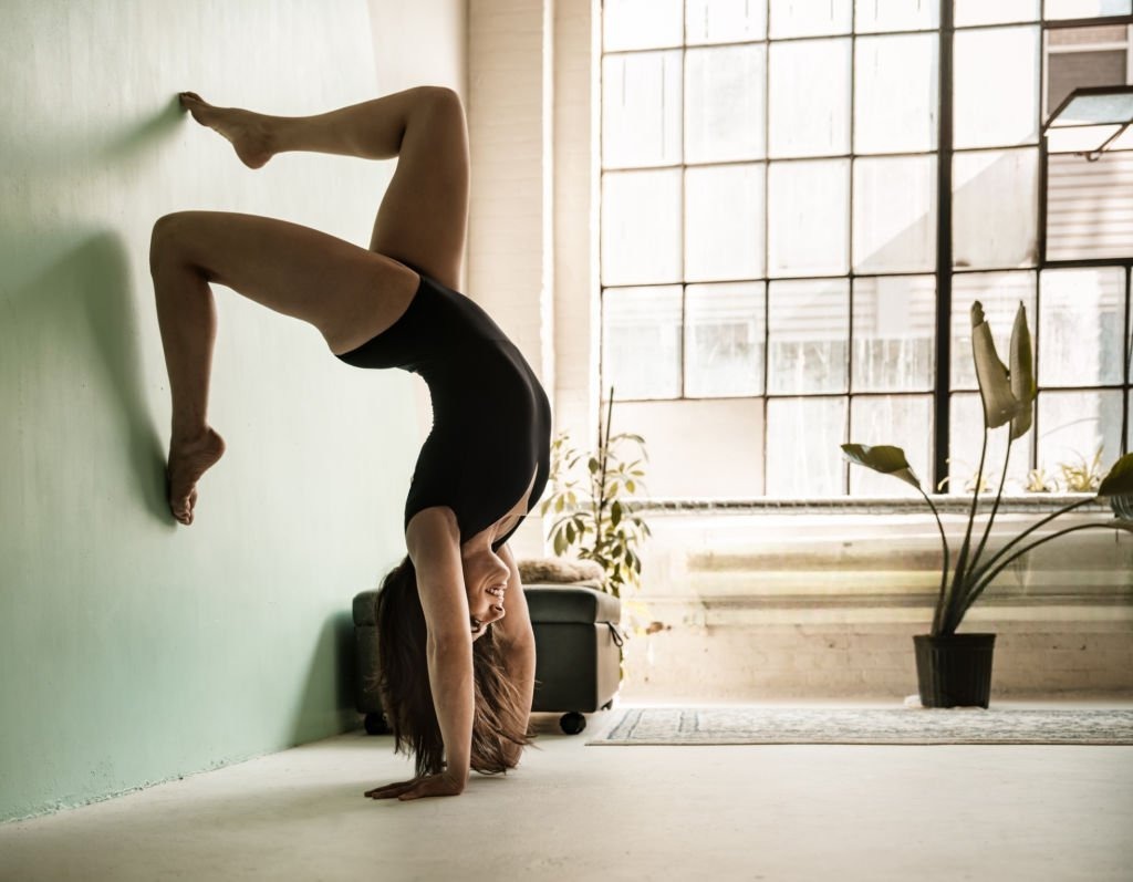 Yoga Poses Using Wall Support 